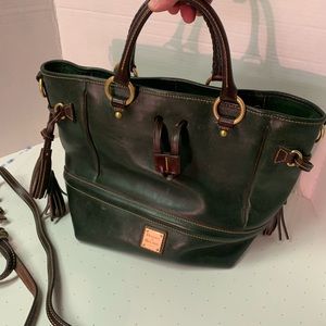 Beautiful, green leather, Dooney and Bourke handbag w/ red interior and brass.